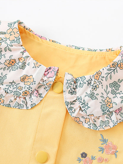 Yellow embroidered ruffle collar top